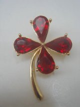 red rhinestone clover brooch