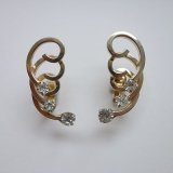 gold wire and rhinestone earring