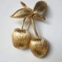 golden apple brooch